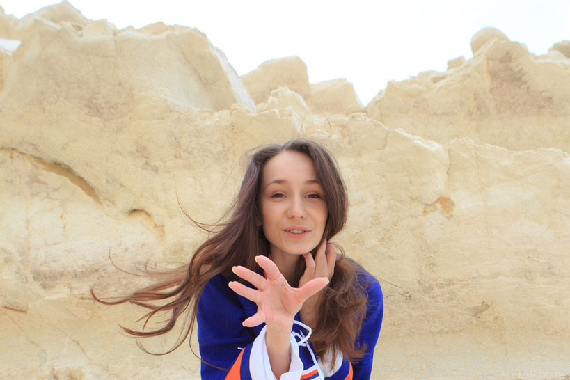 Cute Megan Muse Clambers About On The Rocks In A Giant Sports Shirt That Dwarfs Her Petite Frame - 10