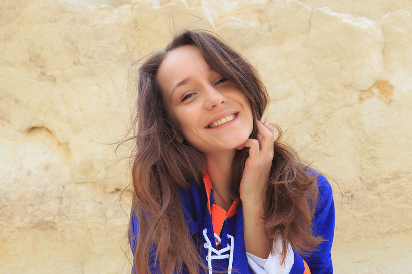Cute Megan Muse Clambers About On The Rocks In A Giant Sports Shirt That Dwarfs Her Petite Frame - 11